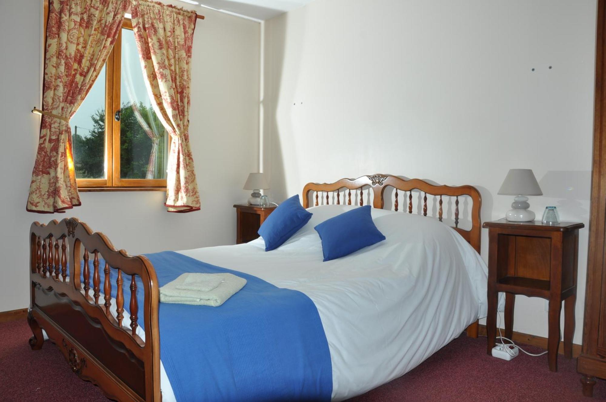 Bed and breakfast La Ferme de Montaigu Chambre photo